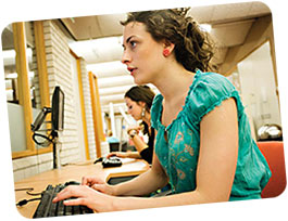 Women working by computer